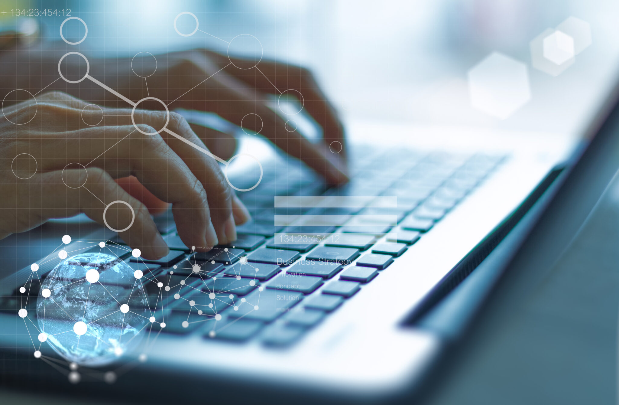 fingers typing on keyboard